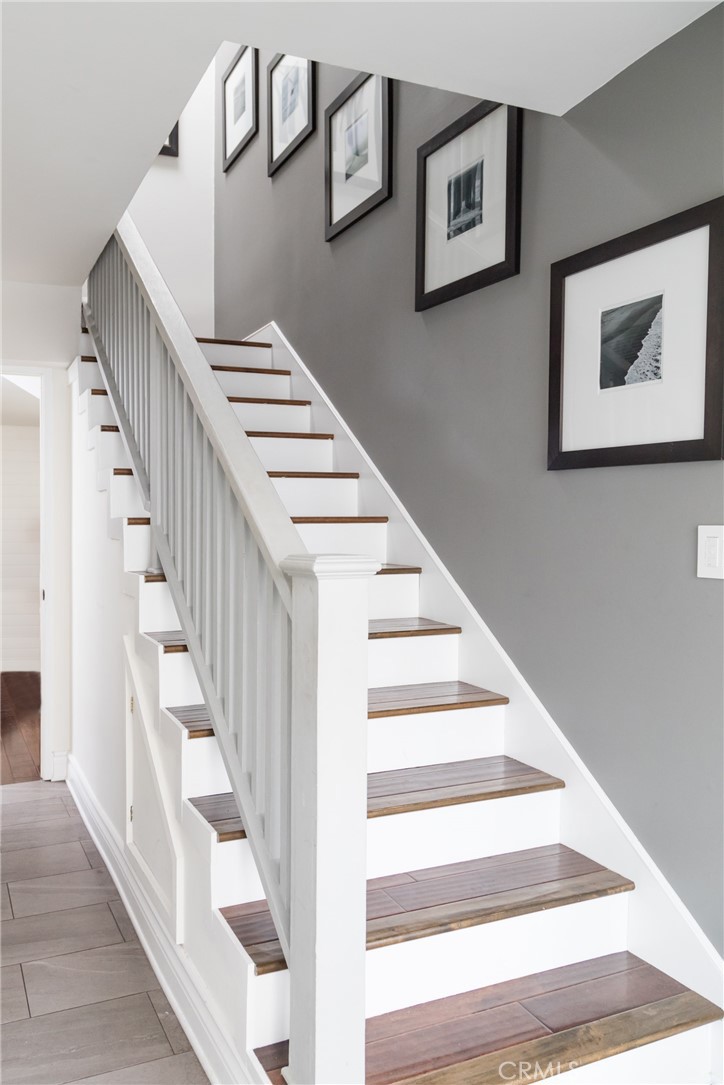 201 21st Place, Unit 2 Manhattan Beach, CA 90266 - Photo 13 of 25 a view of staircase with white walls and white walls
