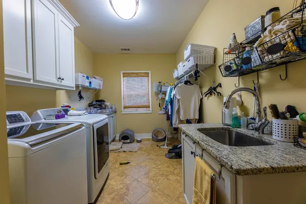 a bed room with a bed and a tv