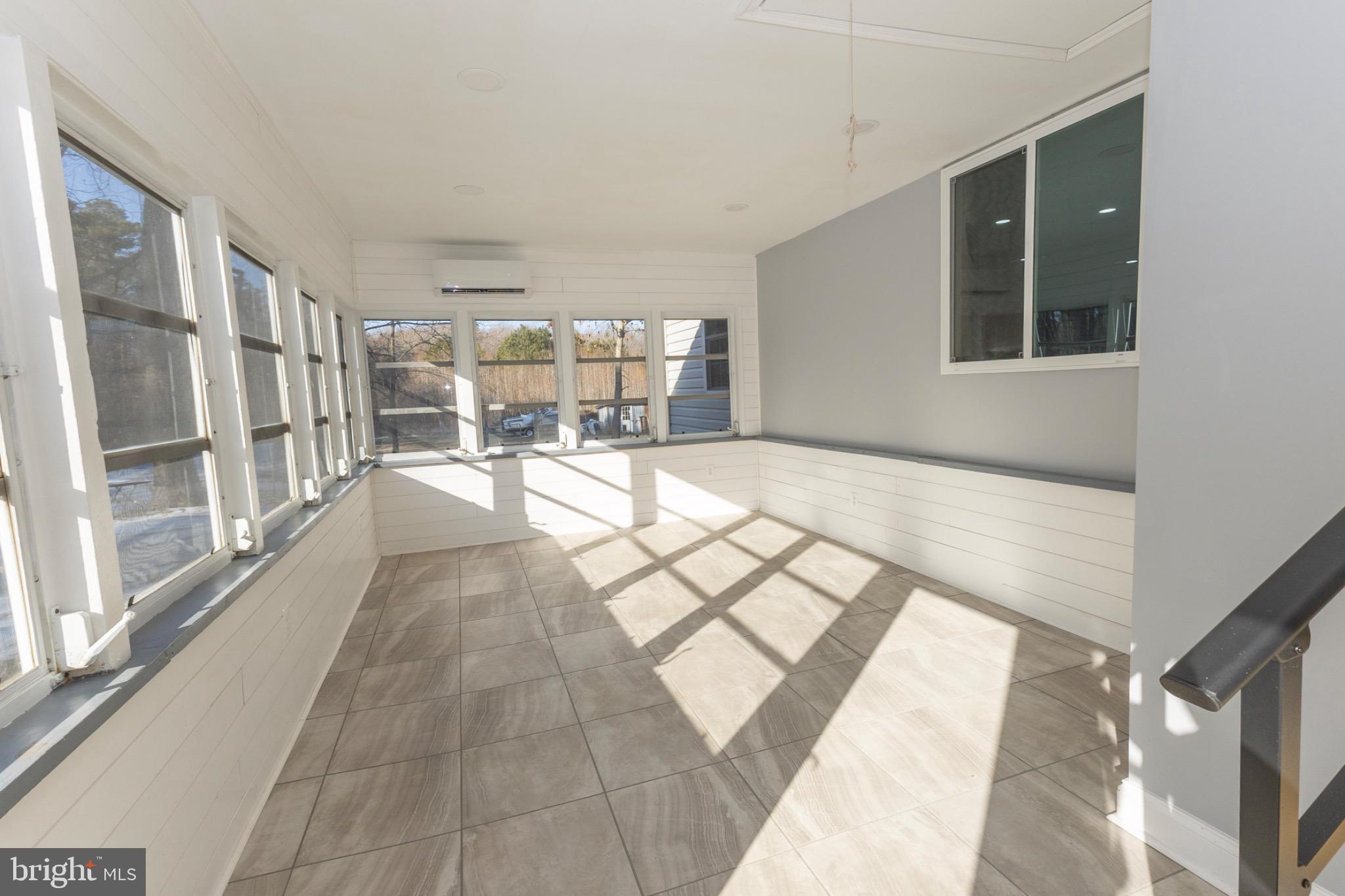 49151 Wynne Road Ridge, MD 20680 - Photo 51 of 80 Bright & airy sunroom with endless possibilities.