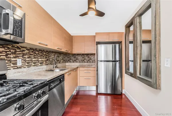 a picture of a cabinet with a white wall