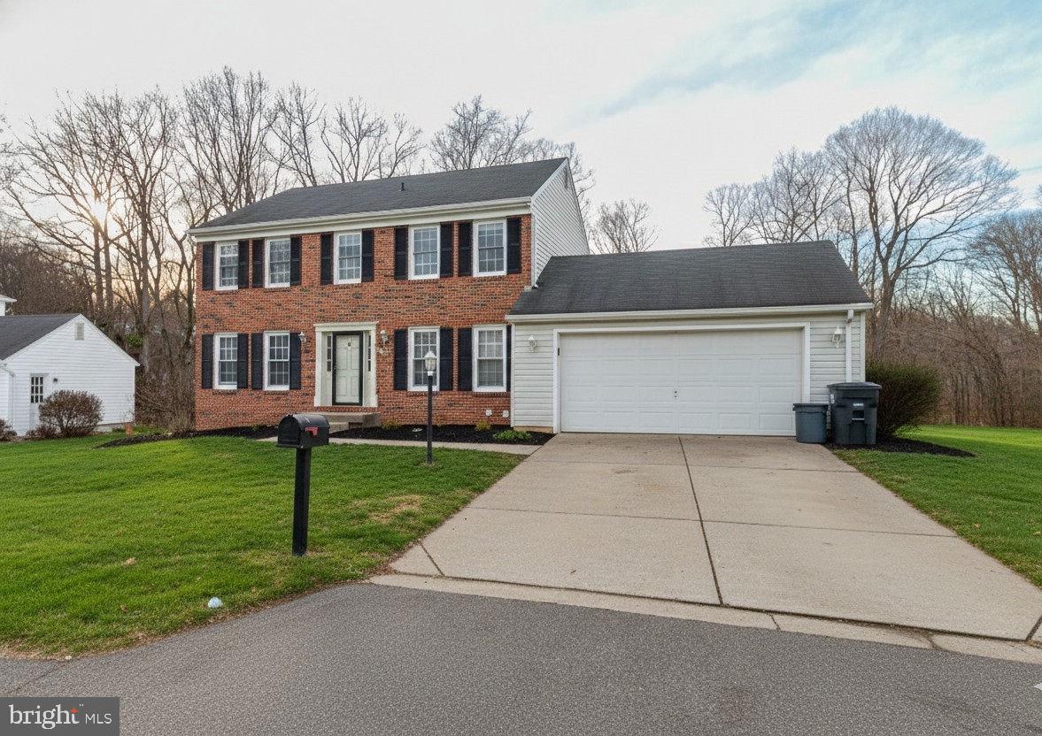 a front view of house with yard
