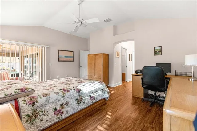 a kitchen with a sink and a refrigerator