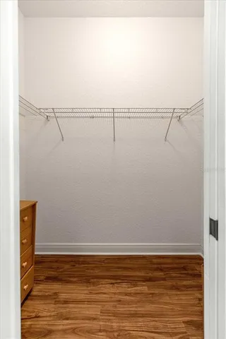 a bathroom with a sink vanity and mirror
