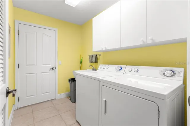 a view of swimming pool with a sitting area