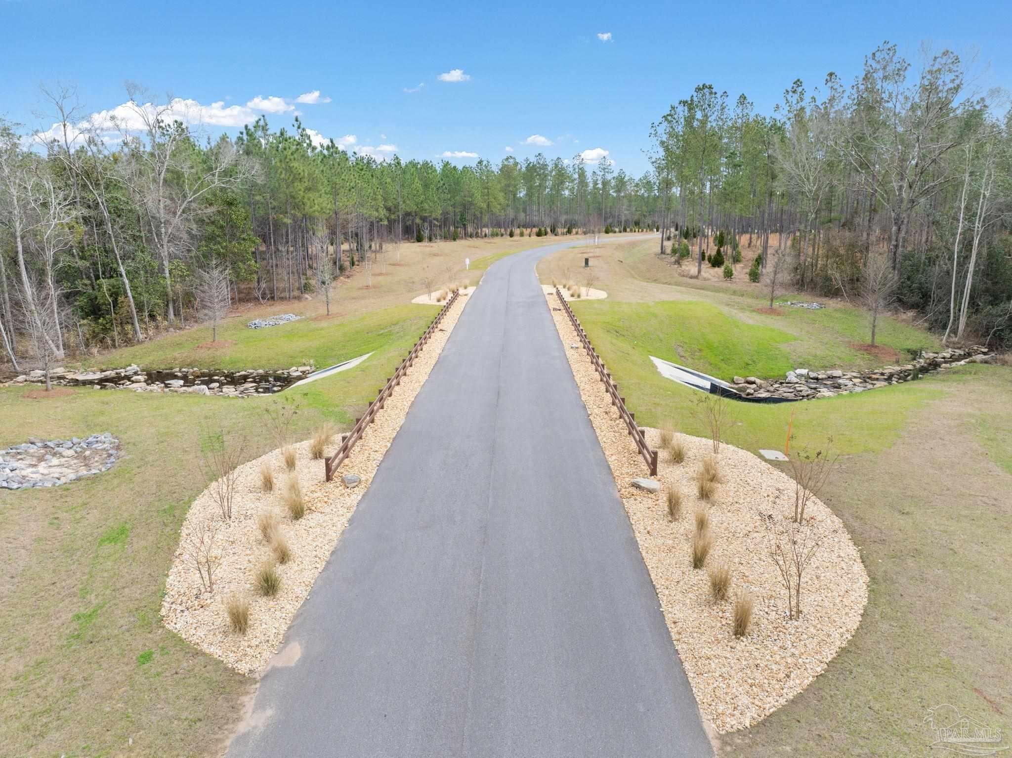 27 Ashbridge Lane Pace, FL 32571 - Photo 14 of 40 an outdoor view with swimming pool and outdoor space