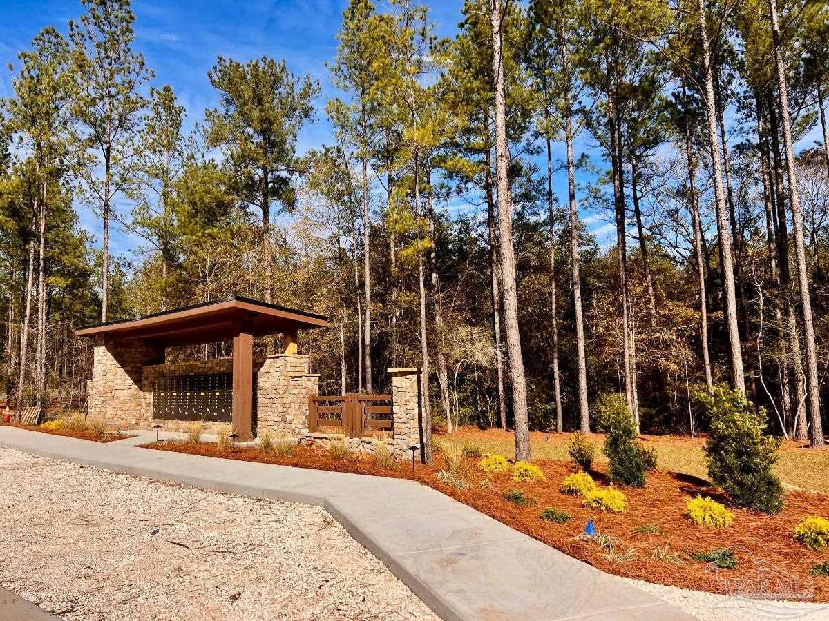 27 Ashbridge Lane Pace, FL 32571 - Photo 17 of 40 front view of a house with a yard