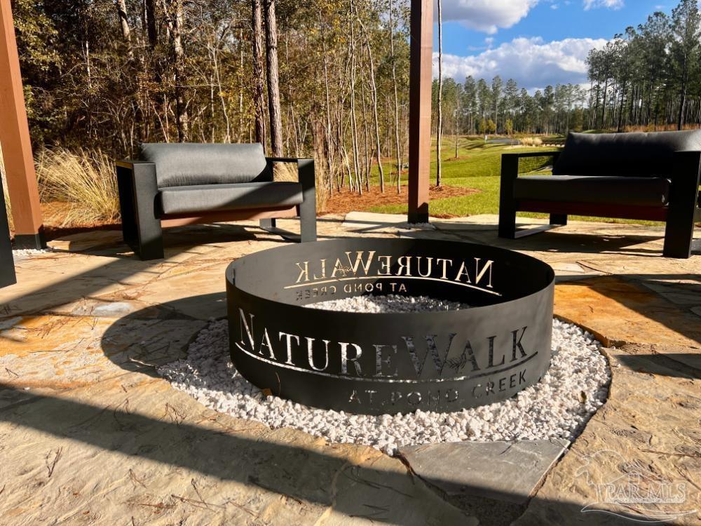 27 Ashbridge Lane Pace, FL 32571 - Photo 5 of 40 a front view of a house with a yard