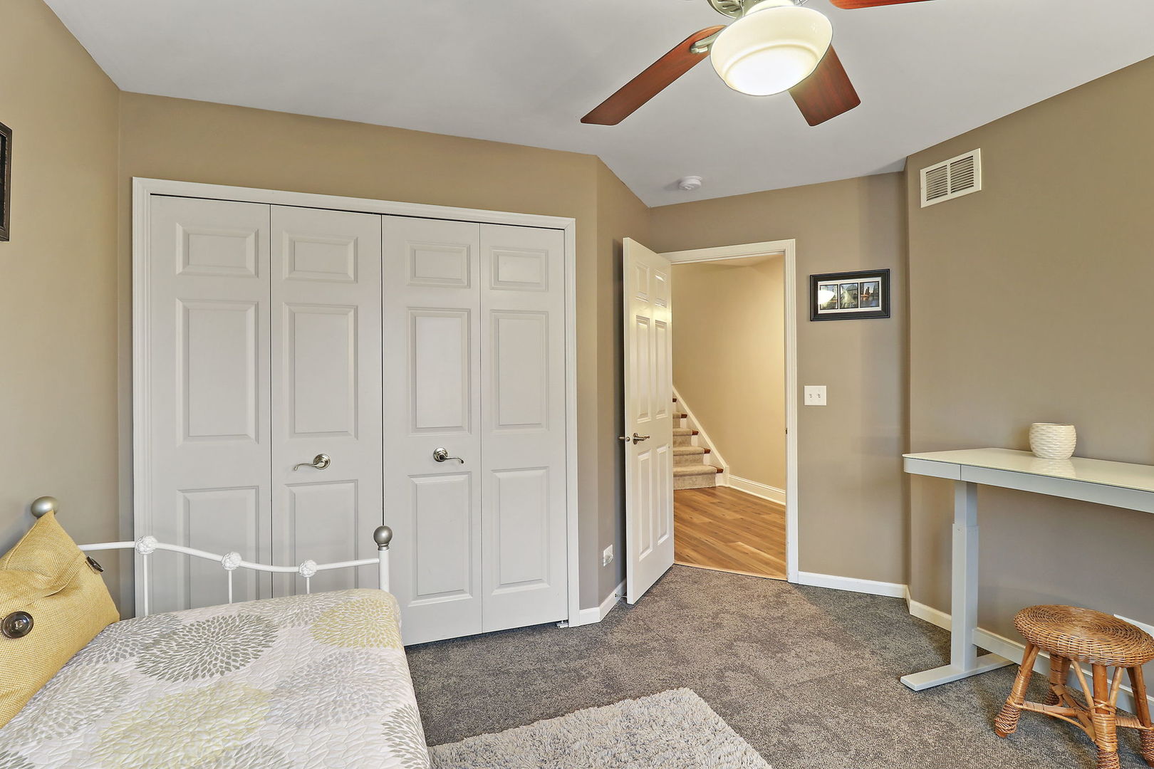 1468 Sutton Circle Wauconda, IL 60084 - Photo 14 of 33 a bedroom with a bed and a chandelier