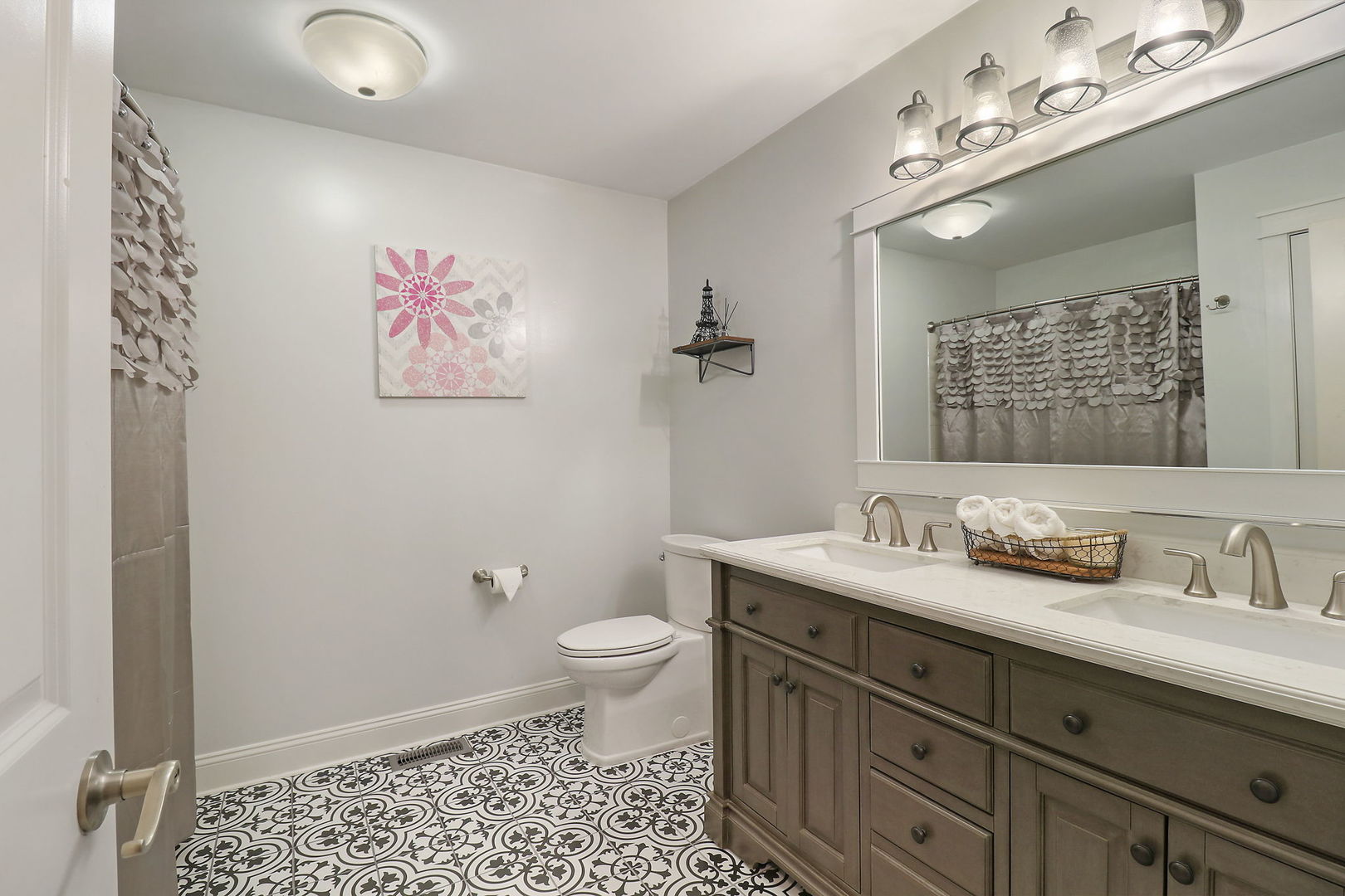 1468 Sutton Circle Wauconda, IL 60084 - Photo 18 of 33 a bathroom with a sink a toilet a mirror and vanity