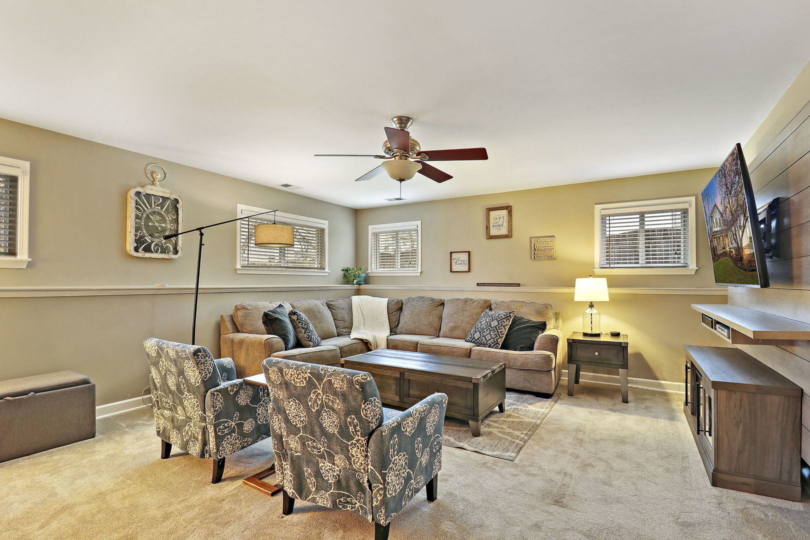 1468 Sutton Circle Wauconda, IL 60084 - Photo 19 of 33 a living room with furniture kitchen view and a wooden floor