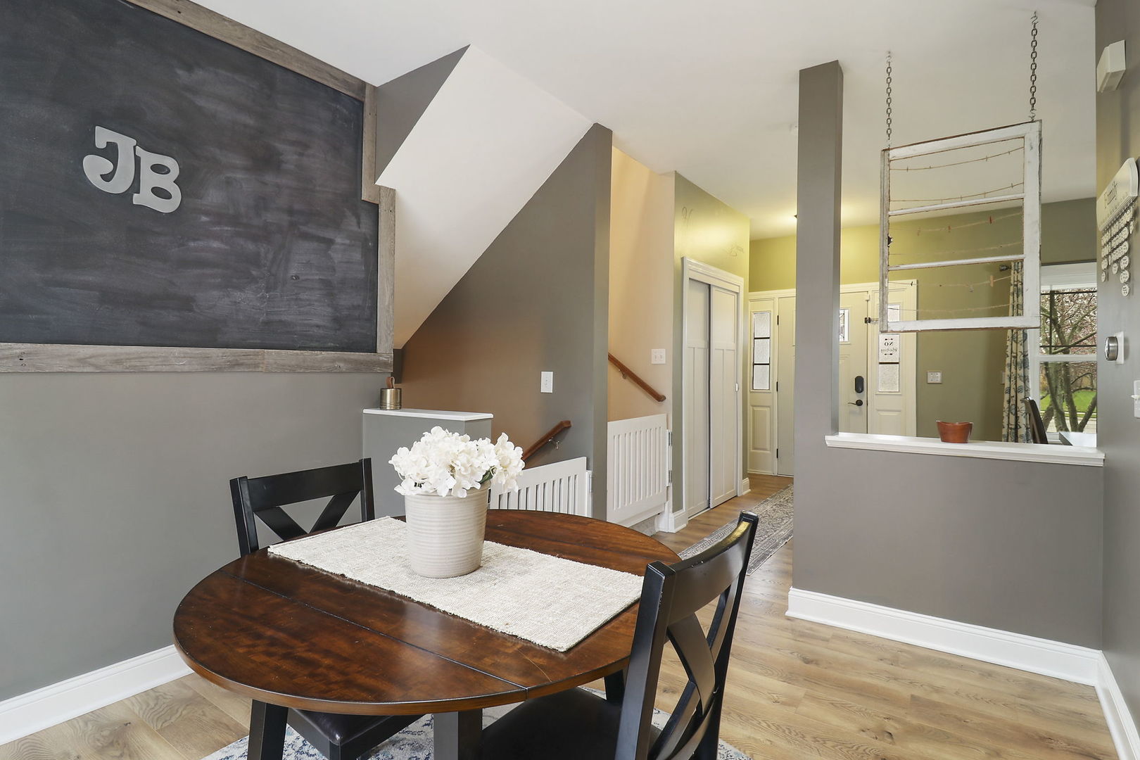 1468 Sutton Circle Wauconda, IL 60084 - Photo 6 of 33 a view of a dining room with furniture and wooden floor