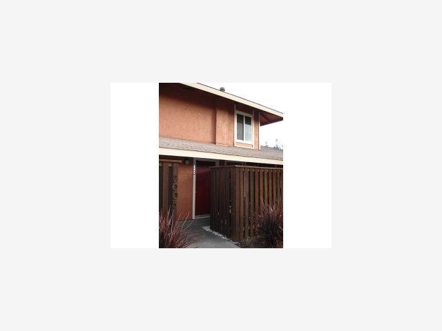 2005 Olivera Road, Unit B Concord, CA 94520 - Photo 8 of 8 a black and white building with wooden fence
