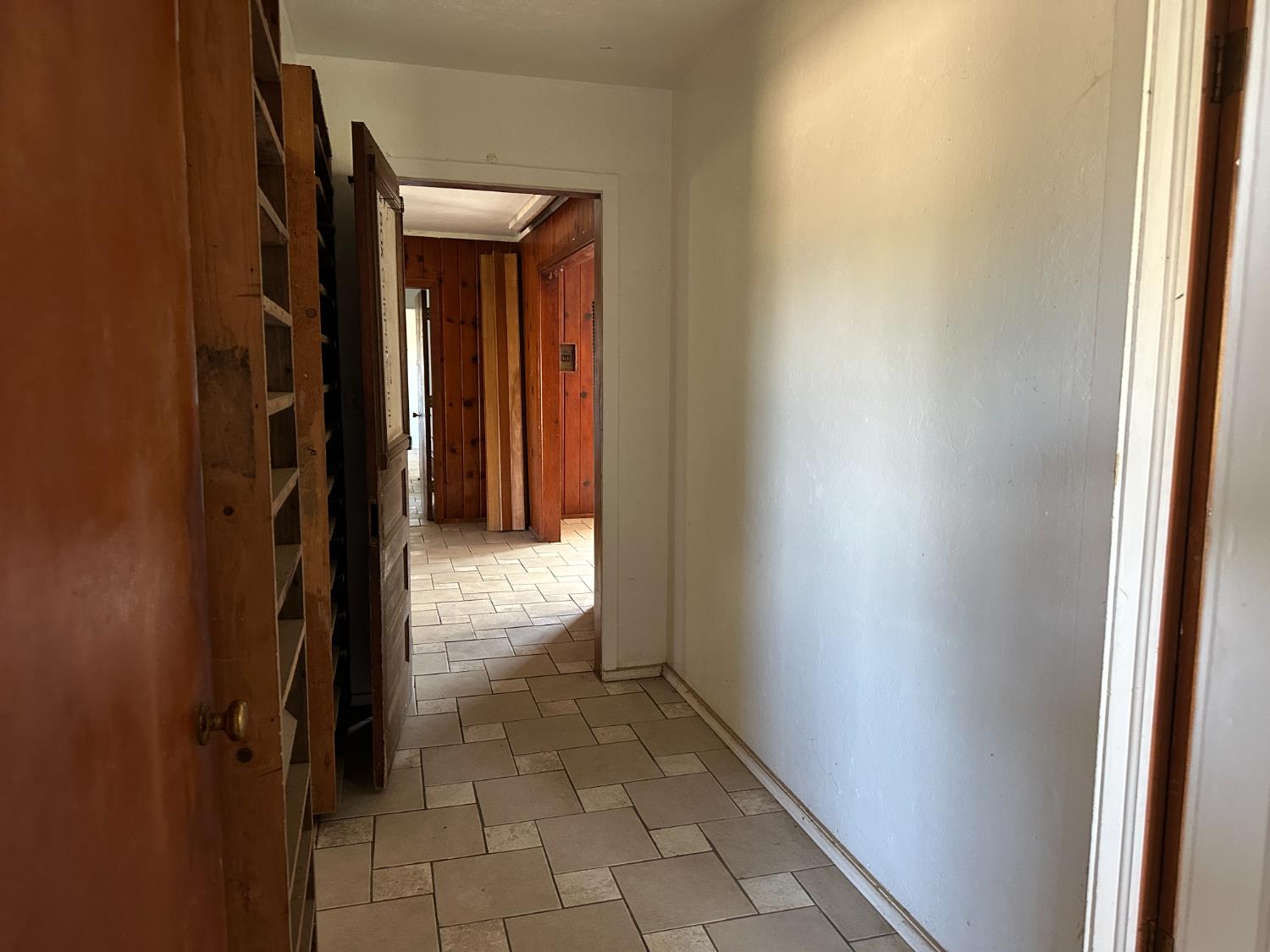19637 East American Avenue Reedley, CA 93654 - Photo 11 of 40 a view of a hallway
