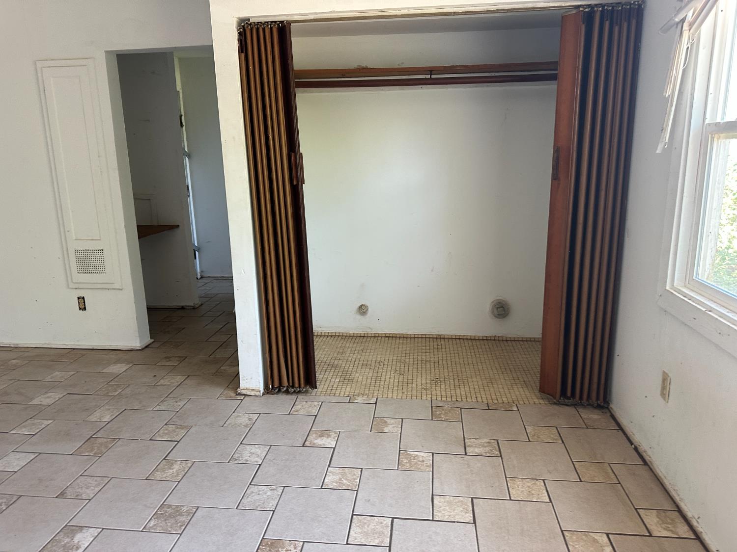 19637 East American Avenue Reedley, CA 93654 - Photo 19 of 40 a view of a room with an empty space and windows