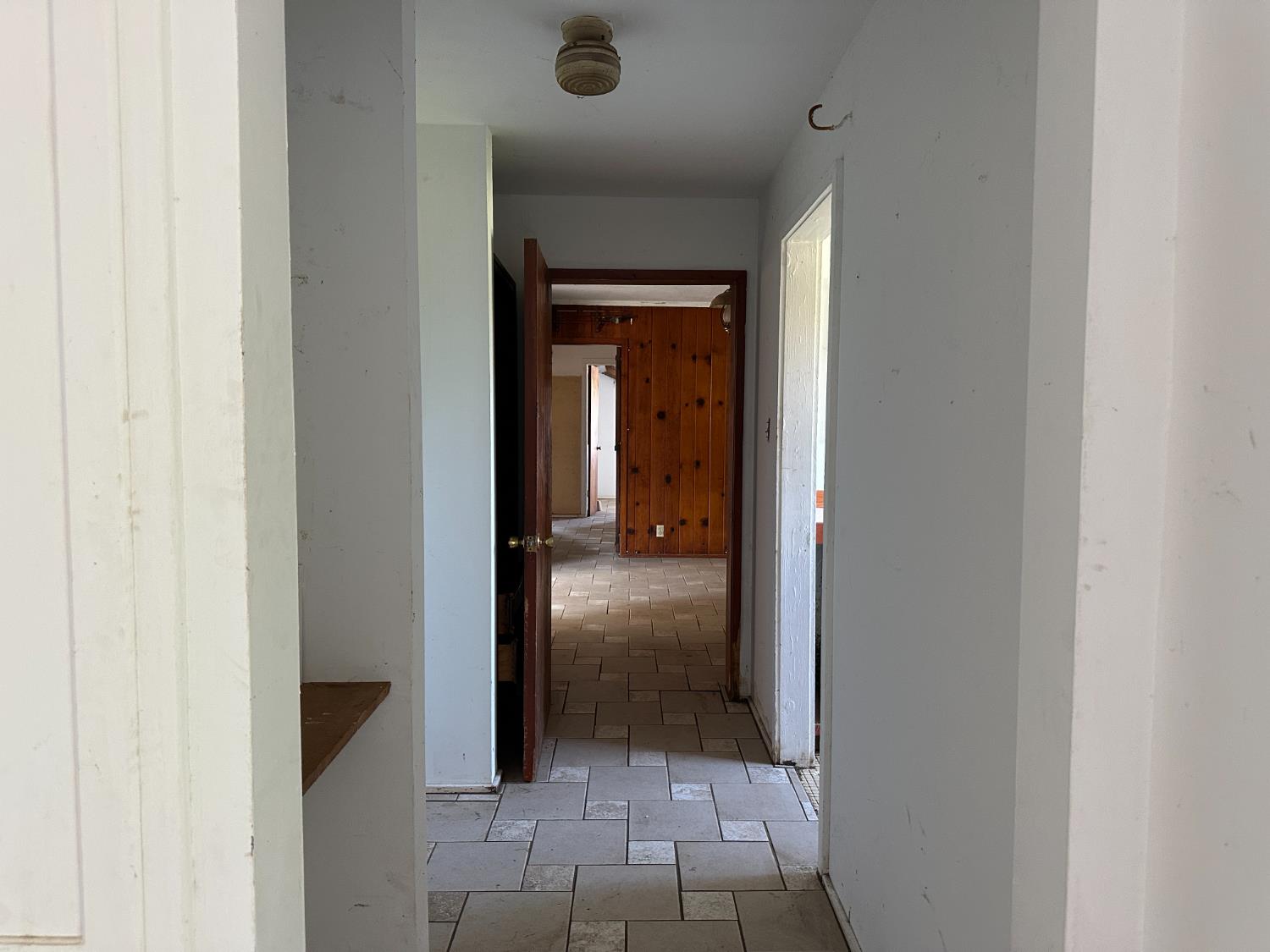 19637 East American Avenue Reedley, CA 93654 - Photo 21 of 40 a view of a hallway