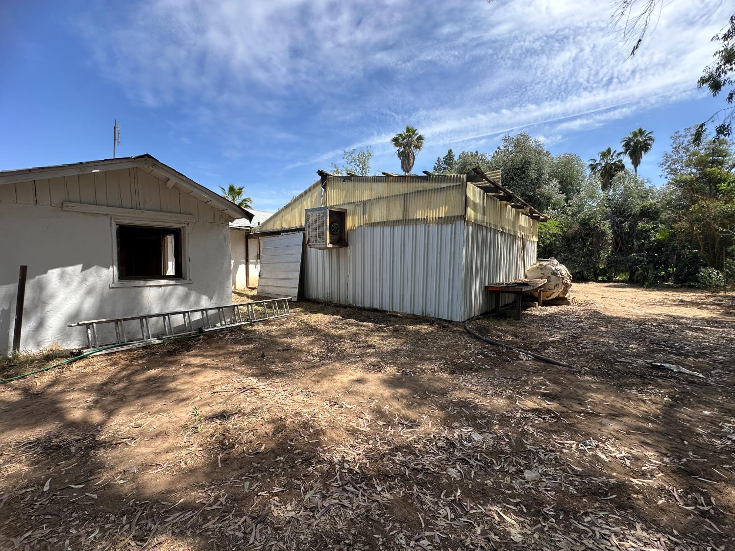 19637 East American Avenue Reedley, CA 93654 - Photo 25 of 40 a view of a house with a yard