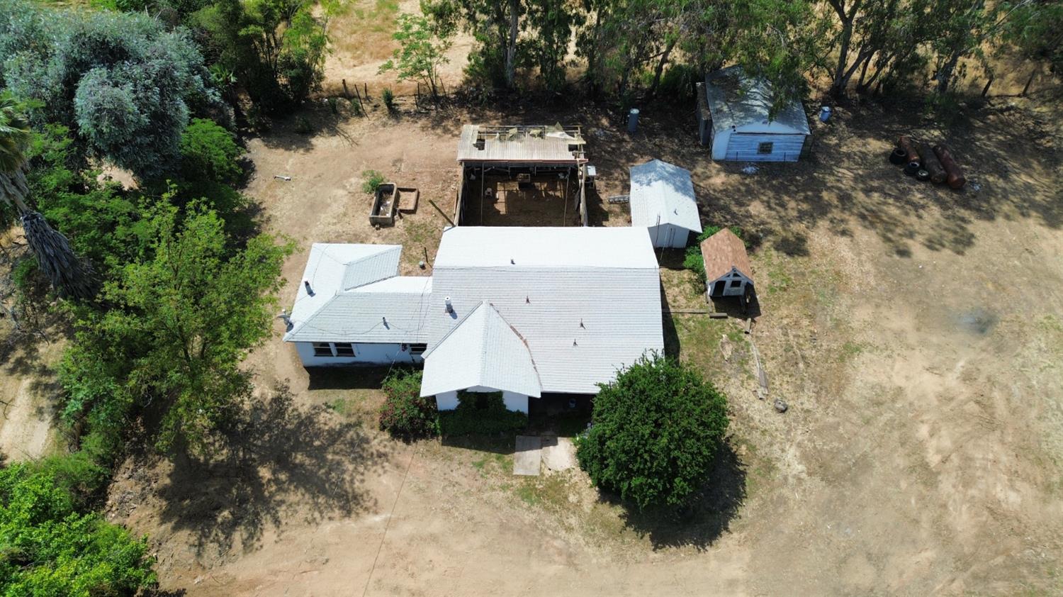 19637 East American Avenue Reedley, CA 93654 - Photo 39 of 40 an aerial view of a house with a yard