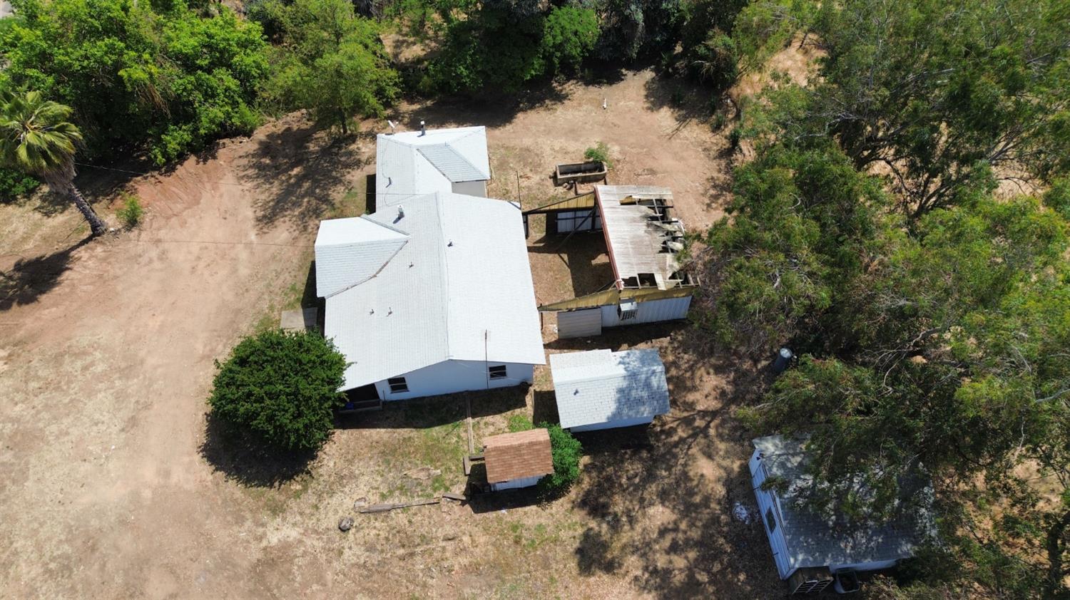 19637 East American Avenue Reedley, CA 93654 - Photo 40 of 40 an aerial view of residential house with outdoor space