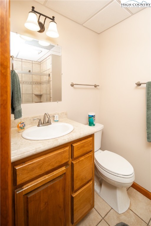 358 Benge Ashe Road Purlear, NC 28665 - Photo 33 of 50 a bathroom with a sink mirror vanity and toilet