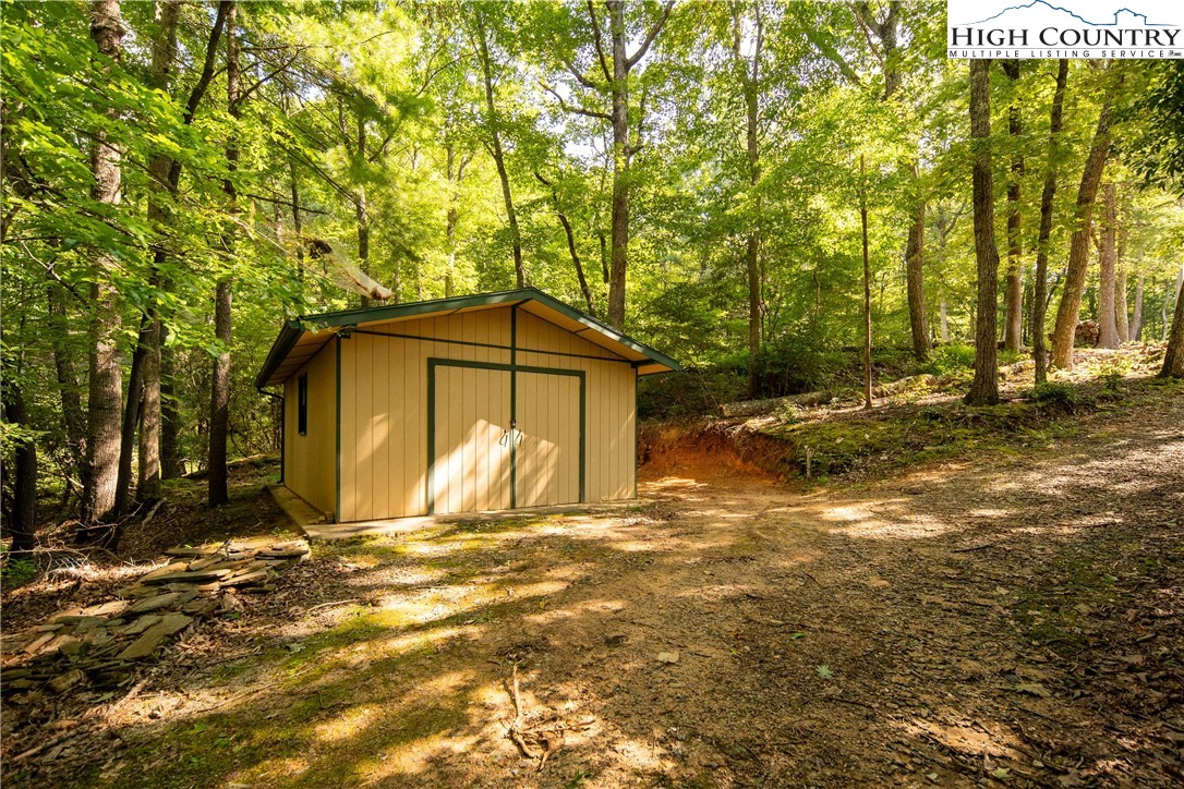 358 Benge Ashe Road Purlear, NC 28665 - Photo 42 of 50 a house view with a outdoor space