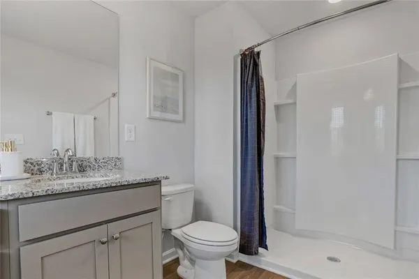 a view of a room with racks on the wall