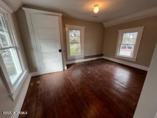 327 Mantoloking Road Brick, NJ 08723 - Photo 11 of 12 an empty room with wooden floor and windows