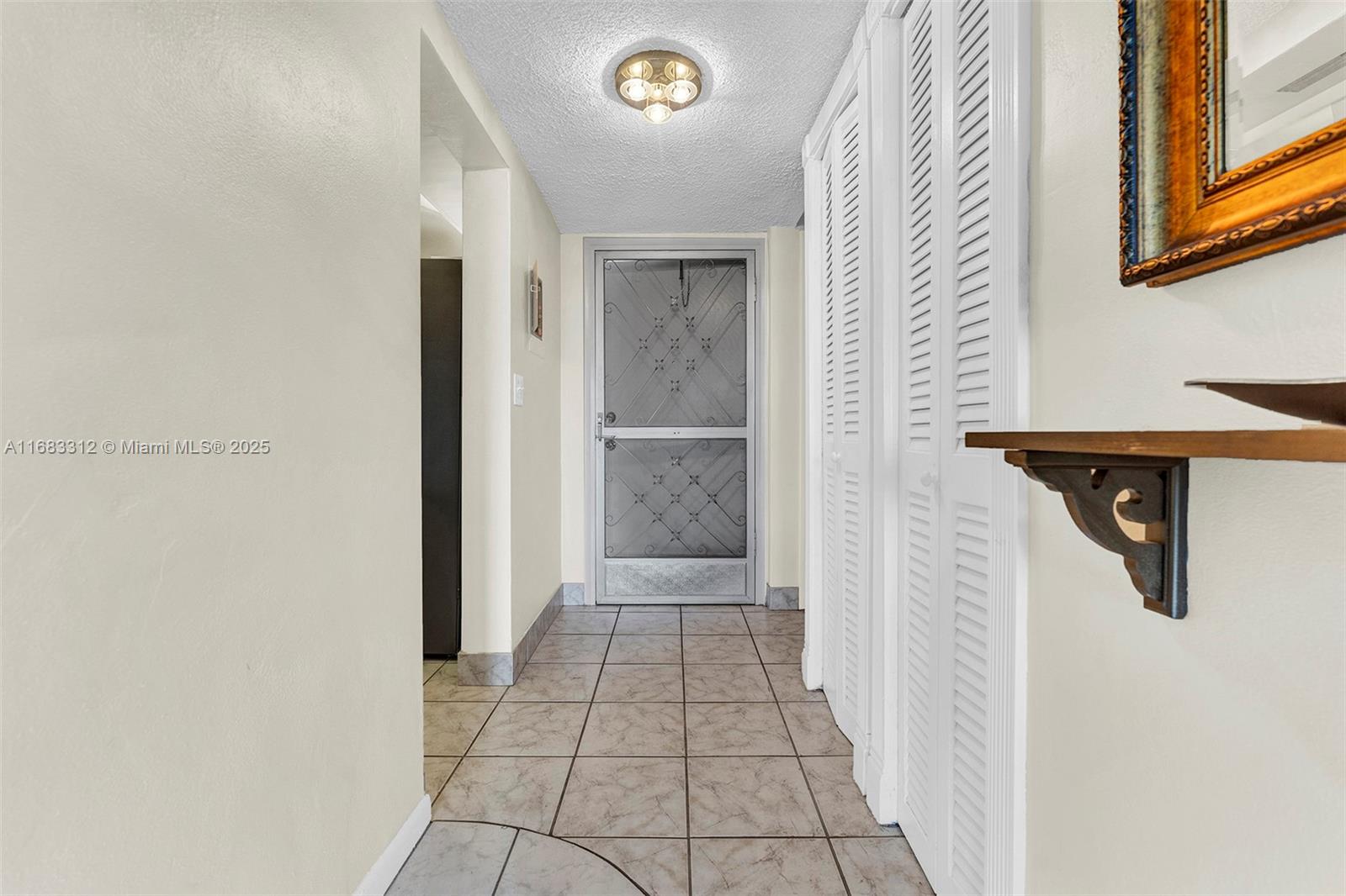 330 Southeast 2nd Street, Unit 303F Hallandale Beach, FL 33009 - Photo 15 of 26 a view of a hallway
