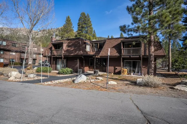 a view of a building with sitting area