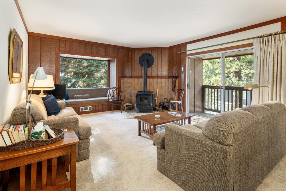 440 Shirley Cyn Road, Unit 50 Olympic Valley, CA 96146 - Photo 2 of 28 a living room with furniture and a large window