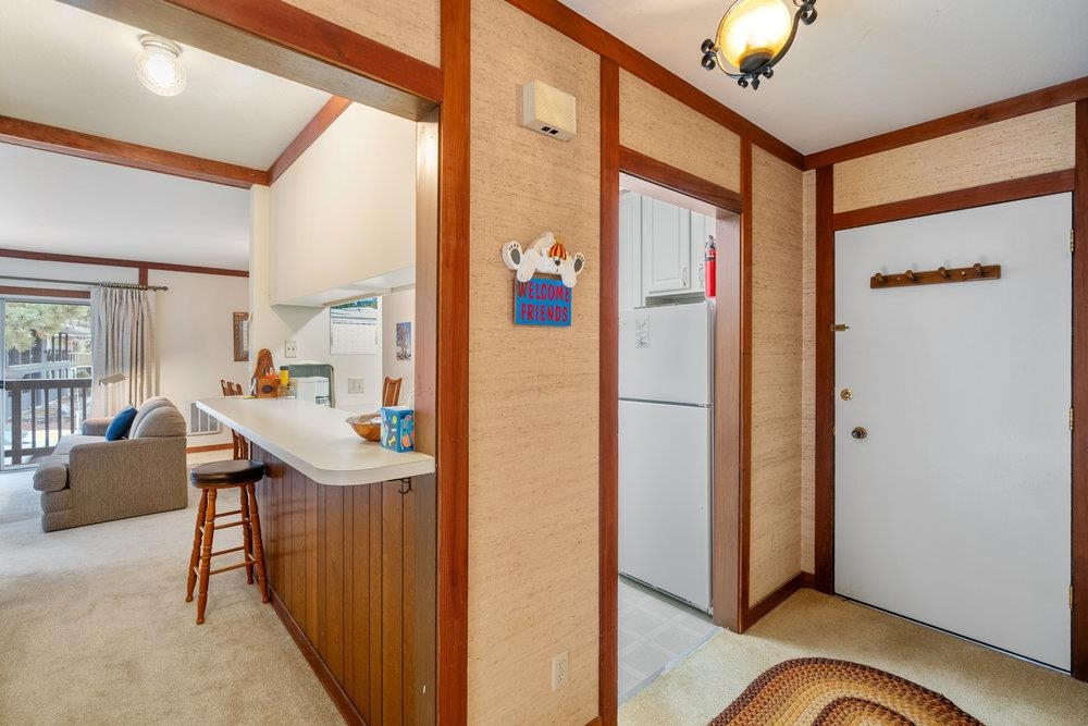 440 Shirley Cyn Road, Unit 50 Olympic Valley, CA 96146 - Photo 23 of 28 a very nice looking room with a large window