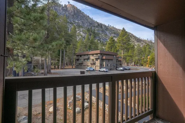 a view of a street from a balcony