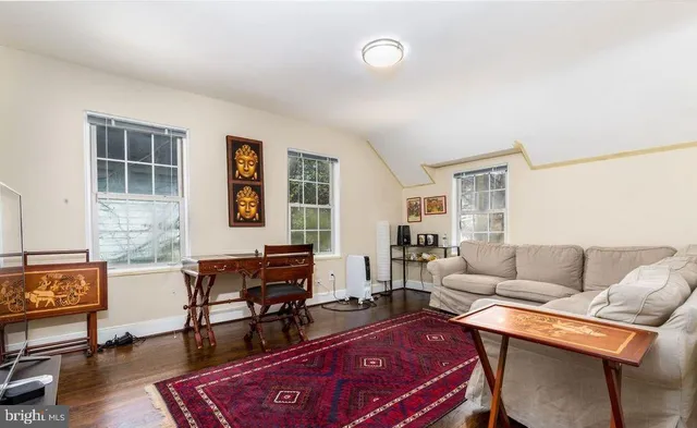a living room with furniture and a couch