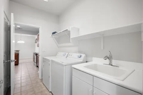 a view of a kitchen and a sink