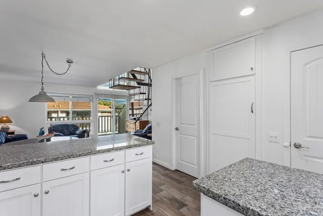 a bathroom with a sink toilet and mirror
