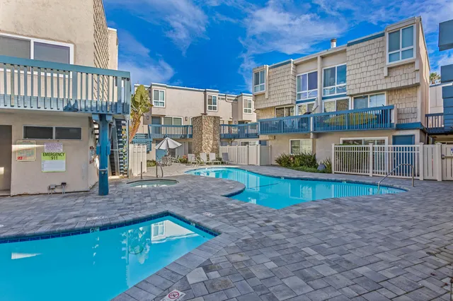a view of a balcony with chairs