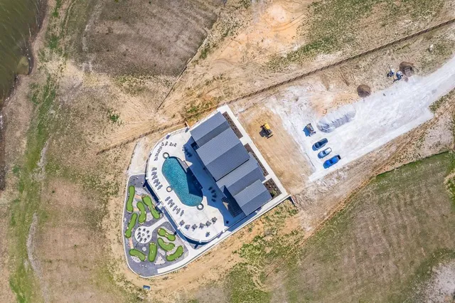 a living room with lots of furniture and a flat screen tv