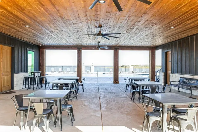 a view of ocean with a big yard