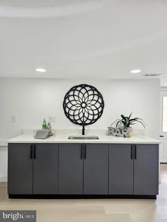 a sink with a cabinets