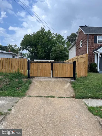a view of backyard with green space