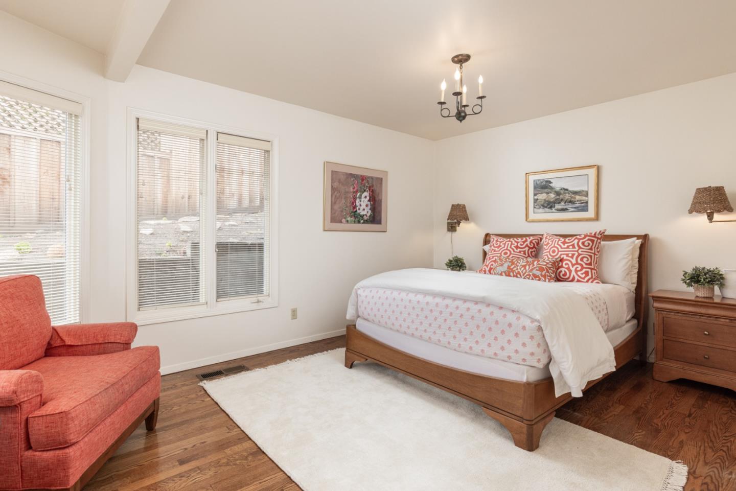 26177 Scenic Road Carmel, CA 93923 - Photo 23 of 30 a bedroom with a bed couch and a window