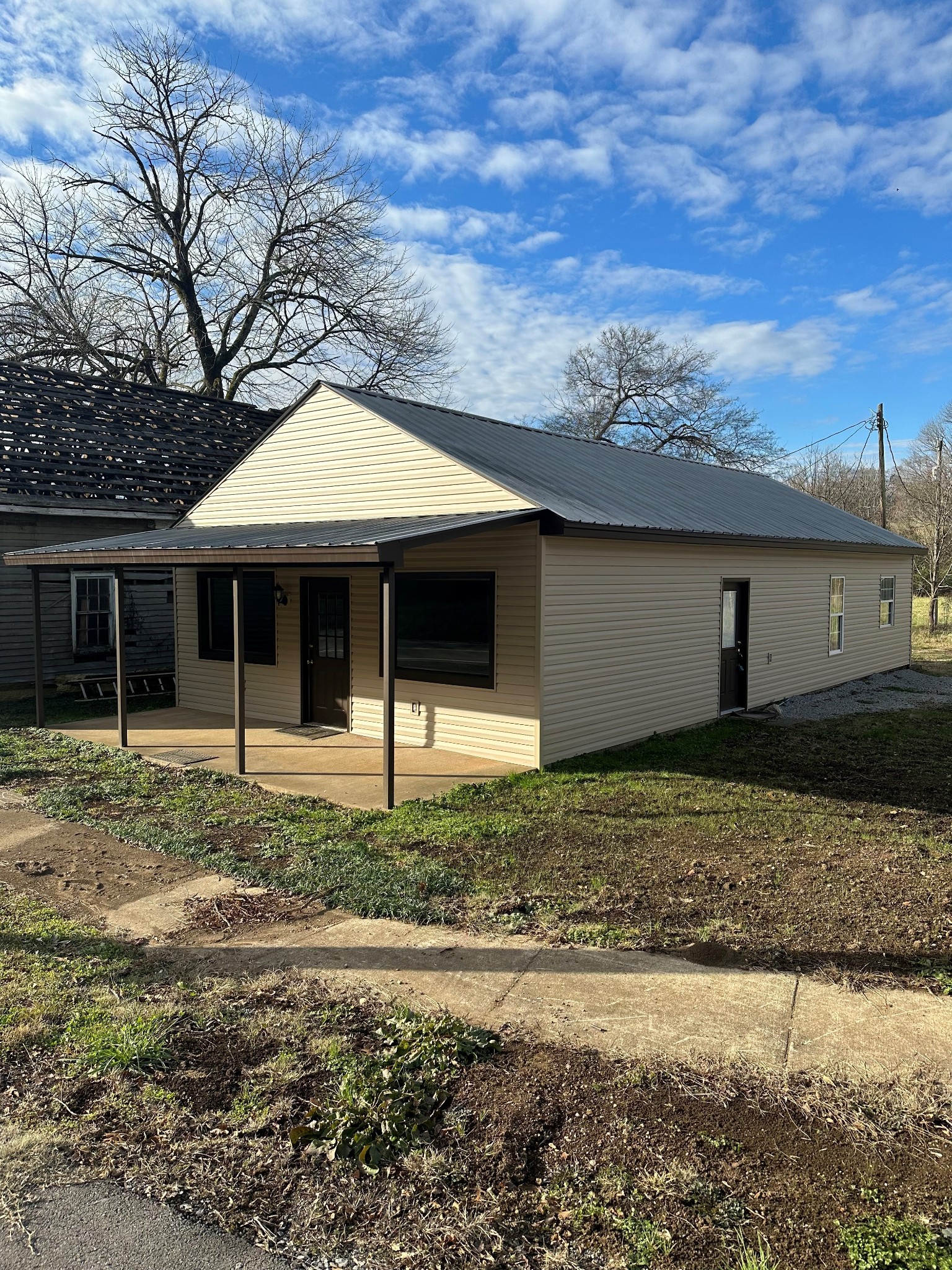 110 Case Road Prospect, TN 38477 - Photo 2 of 10 a front view of a house with garden