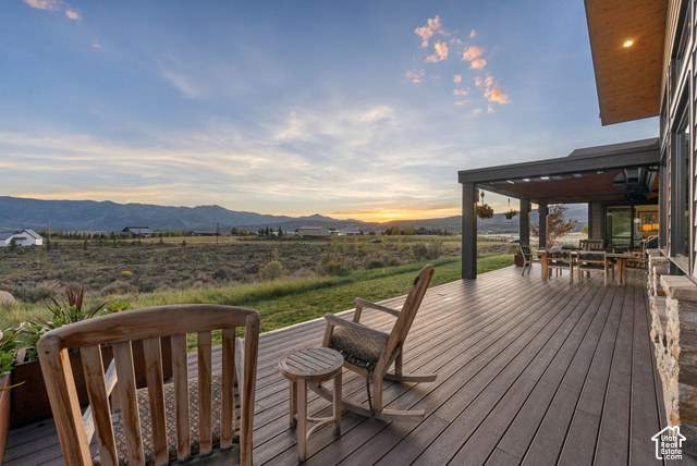 1130 Pace Road Park City, UT 84098 - Photo 32 of 73 Expansive composite deck featuring a covered patio area, recessed lighting, and stone exterior accents