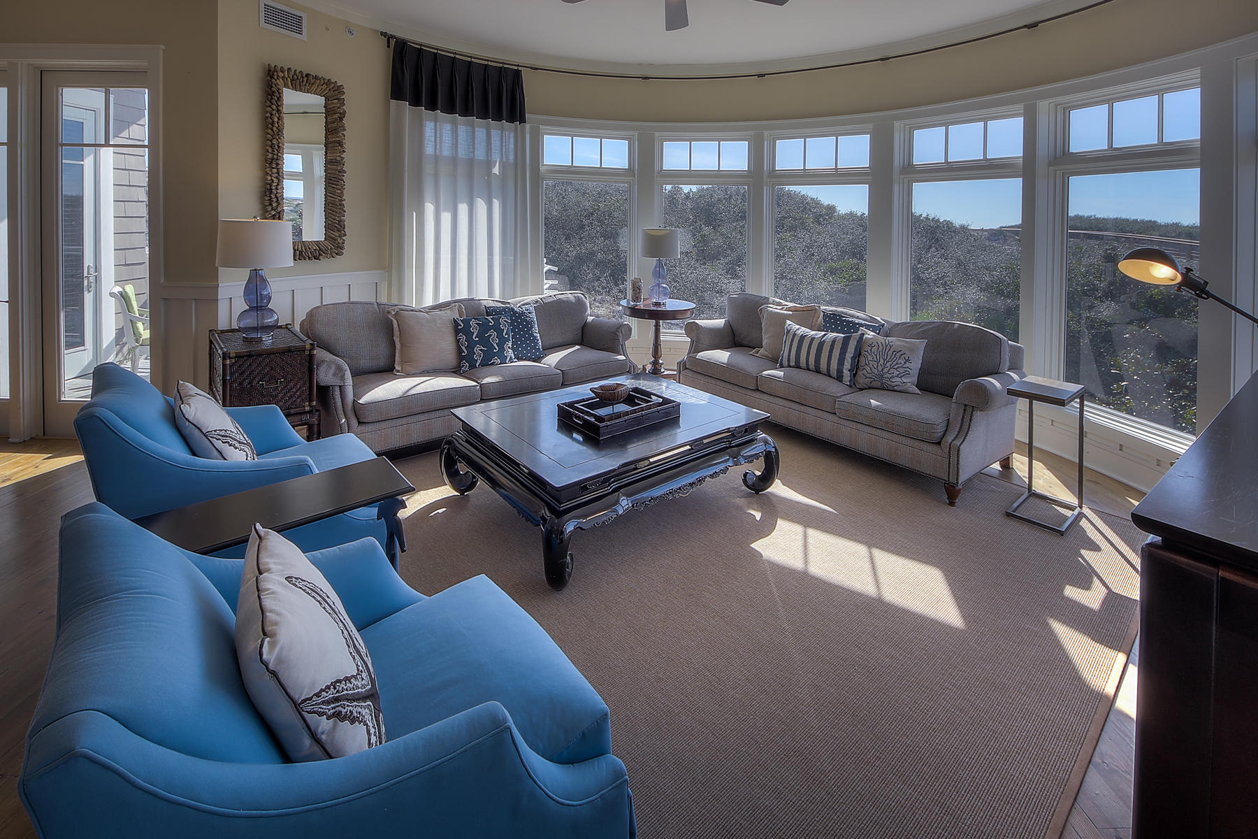 99 Compass Point Way South, Unit 208 Watersound, FL 32461 - Photo 11 of 17 a living room with furniture and a window