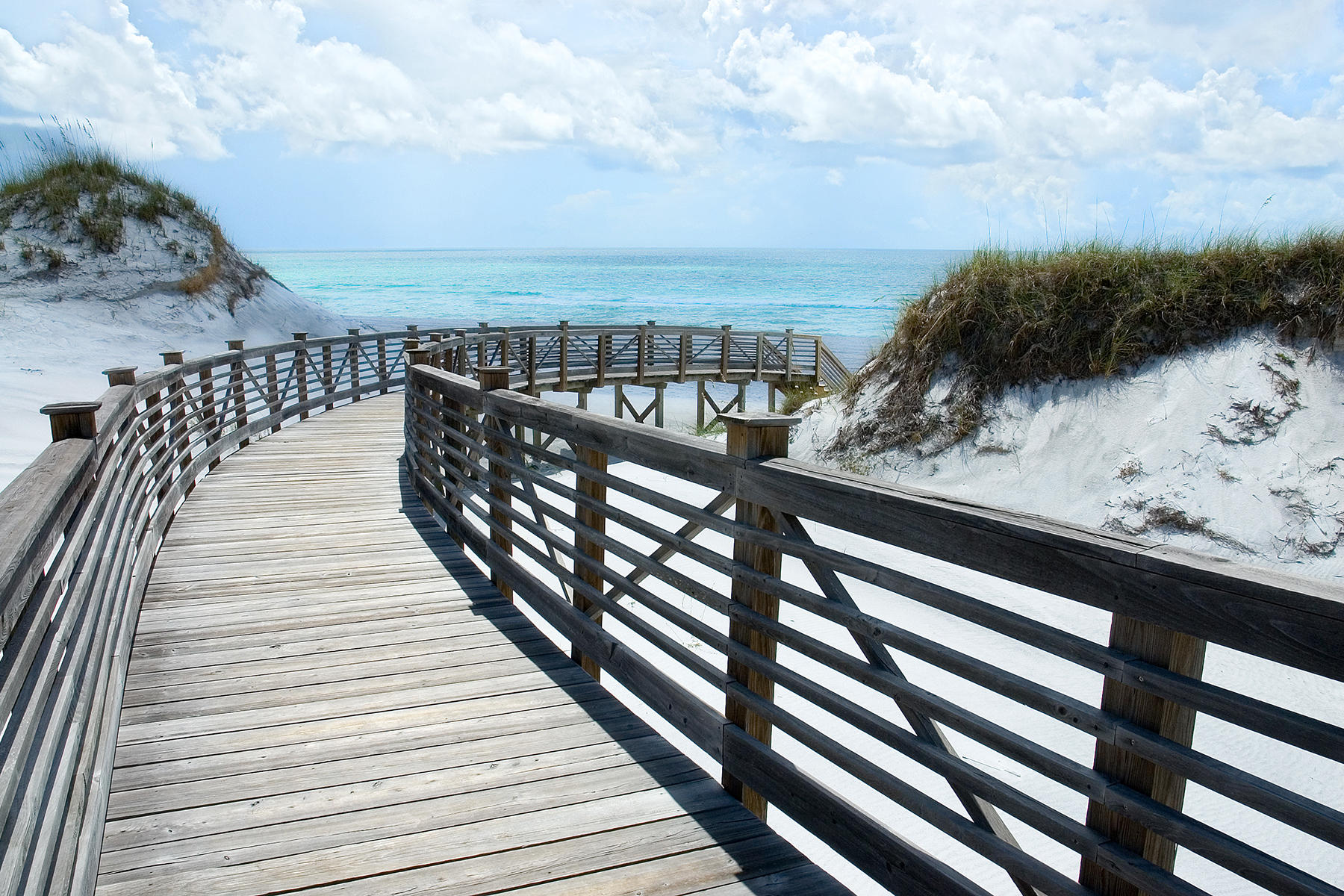 99 Compass Point Way South, Unit 208 Watersound, FL 32461 - Photo 9 of 17 a view of balcony with wooden floor and fence