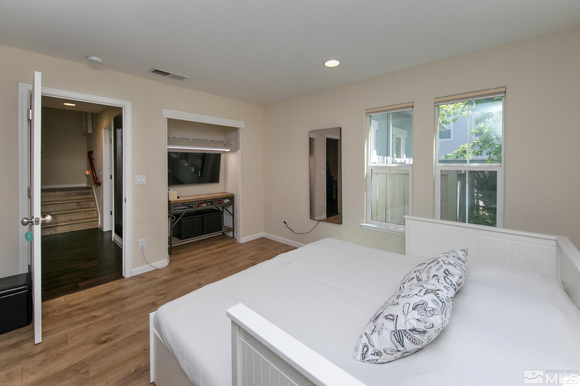 7665 Pebblestone Way Reno, NV 89523 - Photo 14 of 34 a living room with furniture and a flat screen tv