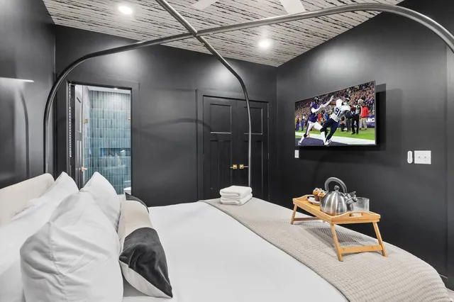 a bathroom with a shower and a bathtub