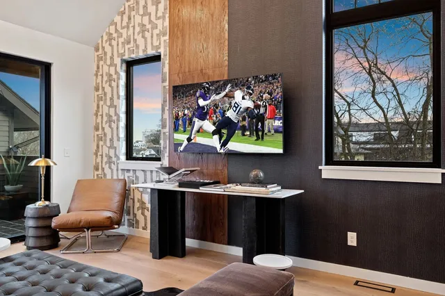 a view of a dining room with furniture and window