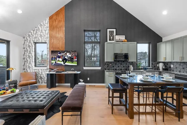 a kitchen with a table and chairs in it