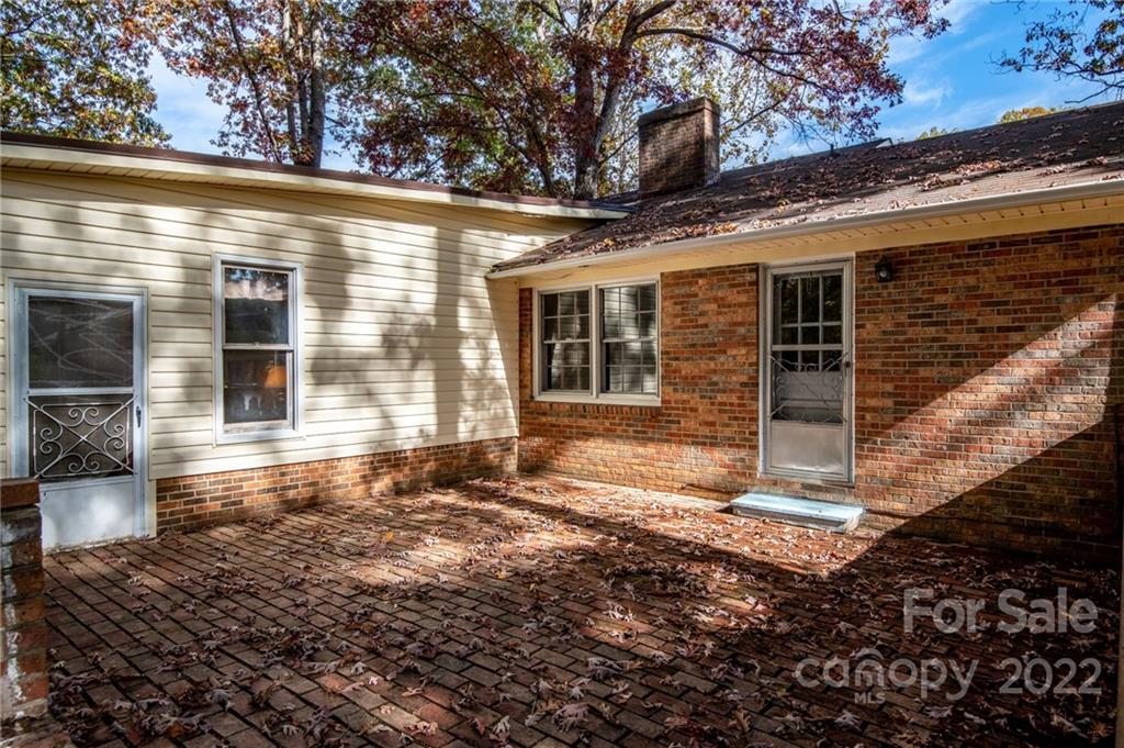 1716 Bethel Road Morganton, NC 28655 - Photo 8 of 26 a view of a house with backyard and garden