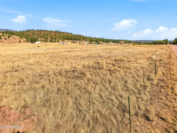 a view of an ocean and a mountain